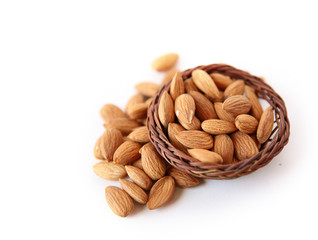 Almond close-up with wooden basket