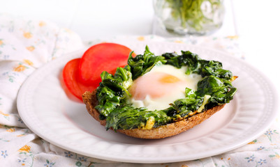 Fried spinach and an egg