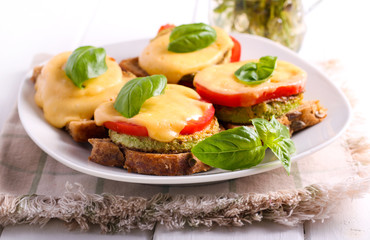 Zucchini, tomato and cheese appetizer