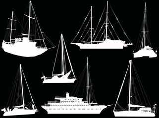 seven white ships isolated on black