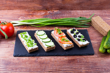 small loafs with cheese and vegetables
