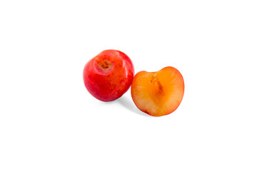 Yellow-orange cherry isolated on a white background.