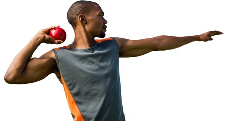 Profile view of sportsman practising shot put 
