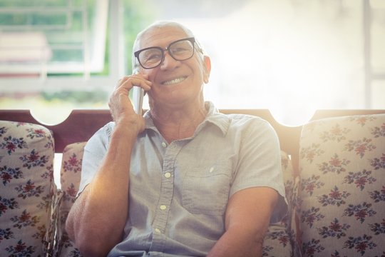 Senior man talking on mobile phone