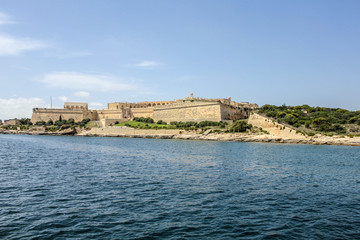 Fototapeta na wymiar The city walls of Valletta with old castle