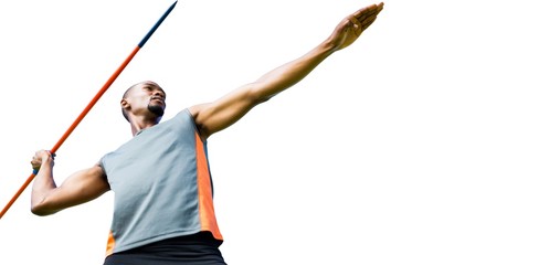 Low angle view of sportsman practising javelin throw 