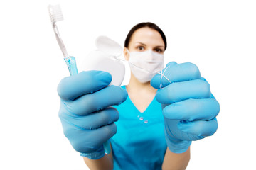 Dentist with tools. Dentist. The concept of dentistry, whitening