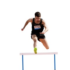 Sportsman practicing hurdles