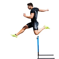Athletic man practicing show jumping