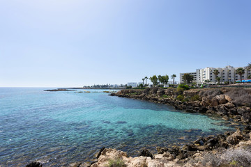 Fototapeta premium Photo of sea in protaras, cyprus island with rocks and hotels.