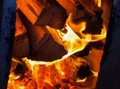 burning woods in the firebox