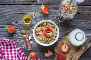 Ready-made granola with dried strawberries and almonds. Healthy breakfast  cereal muesli,   fresh 