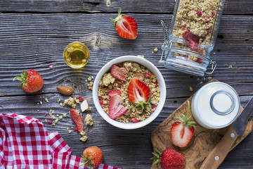 Ready-made granola with dried strawberries and almonds. Healthy breakfast  cereal muesli,   fresh 
