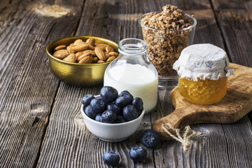 Healthy breakfast ingredients. Cereal, chocolate muesli, fresh blueberries