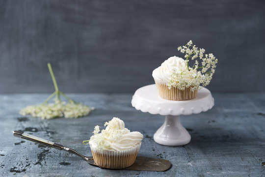 Two cupcakes with elderflower creme
