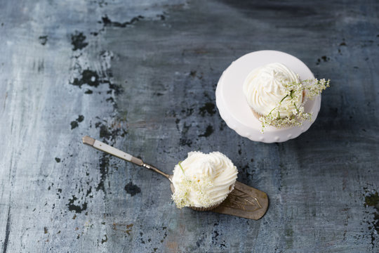 Two cupcakes with elderflower creme