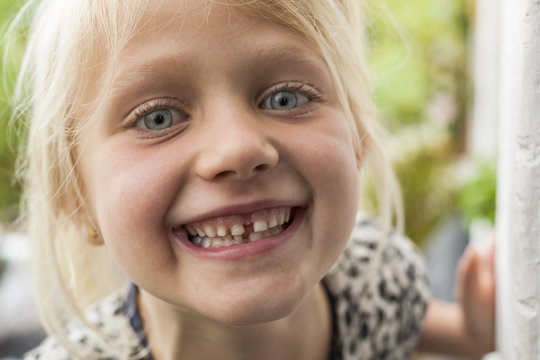 Portrait of happy blond girl