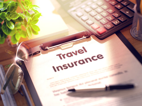Business Concept - Travel Insurance on Clipboard. Composition with Office Supplies on Desk. Travel Insurance- Text on Clipboard with Office Supplies on Desk. 3d Rendering. Toned and Blurred Image.