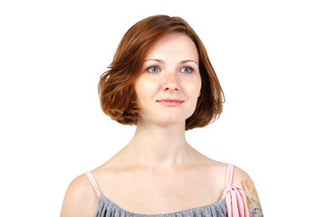 Fototapeta premium the portrait of young adult beautiful girl with freckles and red hair on white background 