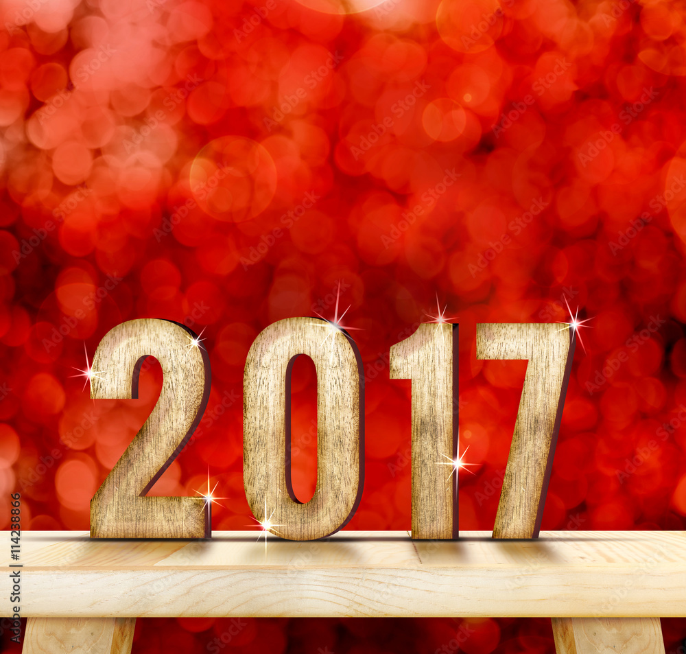 Poster 2017 year wood texture on plain wood table top with red sparklin