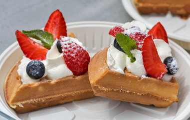 closeup of strawberry, blueberry and cream cake