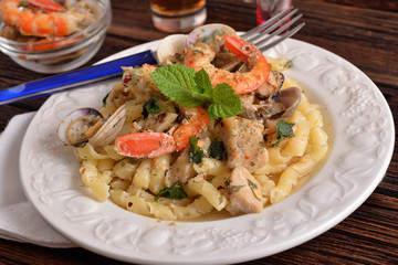 pasta dish with fish and seafood
