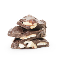 stacked pieces of homemade chocolate with cashew