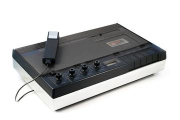 Obraz premium Old vintage stereo cassette recorder with a microphone isolated on white background