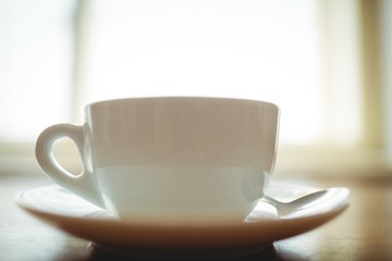 Close-up of fresh coffee served on table