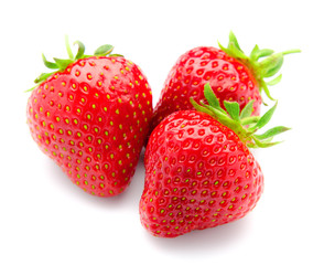 Strawberries with leaves, isolated on a white background.