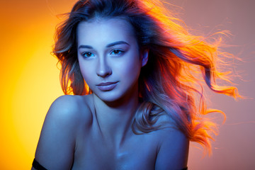 beautiful girl in colored light