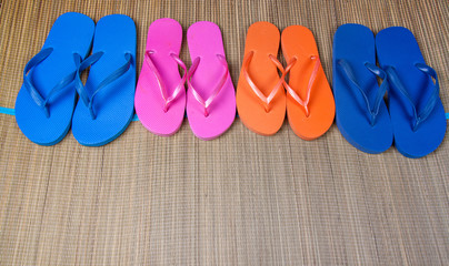 flip-flop sandals on grunge sackcloth