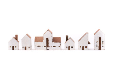 Miniature white wood house on white background