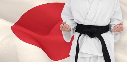 Composite image of female athlete posing in kimono