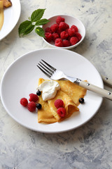 breakfast crepe with raspberry