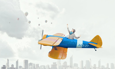 Girl flying old plane . Mixed media