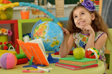 Fototapeta premium Cute student girl at class