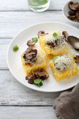 italian polenta with slice of mushrooms