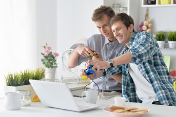 men playing computer games