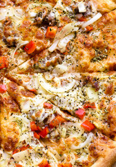 Italian pizza with sausage, red peppers and cheese mozzarella, onion, rosmary and basil