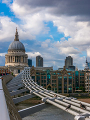 Fototapeta na wymiar Millenium bridge and St Paul cathedral in London