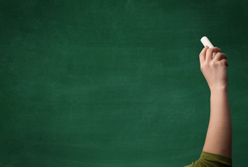 Hand writing on clean blackboard