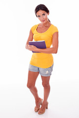 Smiling young brunette with a tablet pc