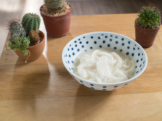 Thai sweetmeat made of vermicelli, coconut milk and sugar ( Pla Krim )