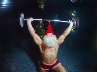 Underwater Santa Claus in the pool