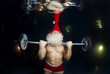 Underwater Santa Claus in the pool