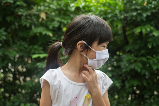 Healthcare - girl wearing a protective mask
