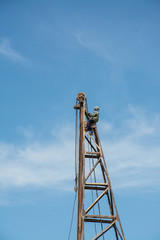 people on rig piling in the construction site