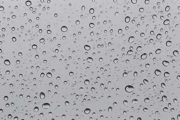 Drop of water for the background on glass car window to abstract
