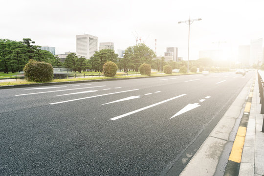 traffic on city street in morning in tokyo japan